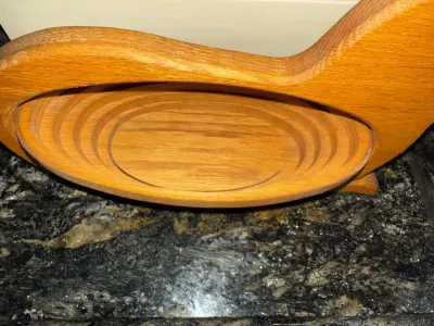 Top view of wooden collie basket showing telescoping feature.