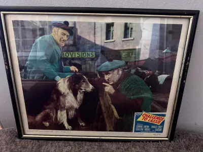 Framed movie picture from 'Challenge to Lassie' with two men and a collie dog.